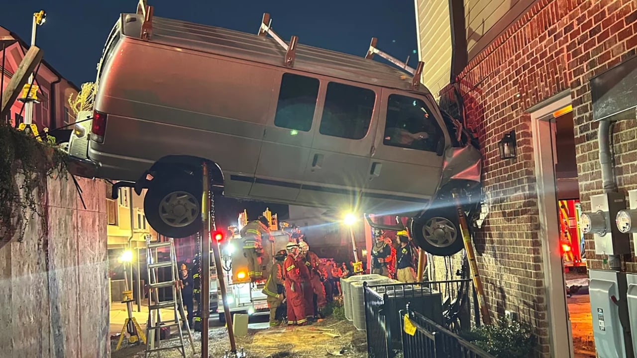 Driver Sustains Minor Injuries After Van Crashes Into Acworth Townhome