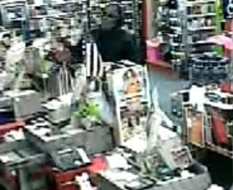 Masked gunman points gun at employees during CVS Pharmacy robbery