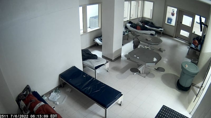 Russell Fincham (lower left) in jail detox unit