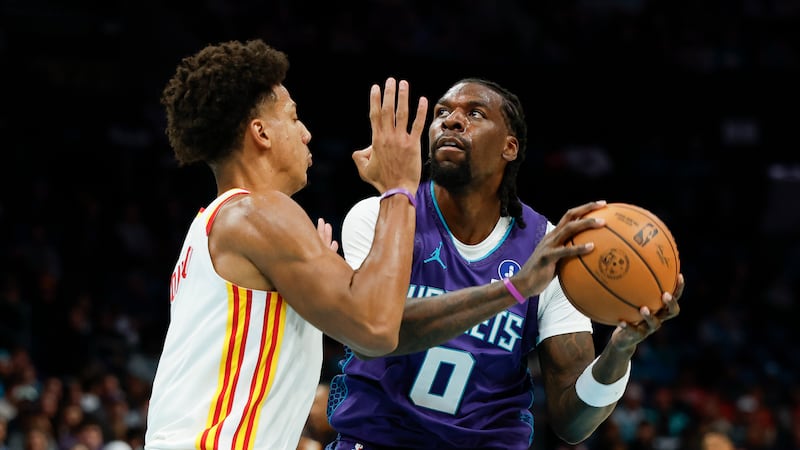 Charlotte Hornets center Naz Reid (0) looks to shoot against Atlanta Hawks forward Jalen...