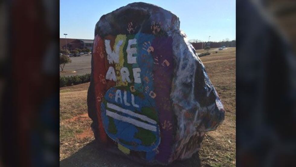 Painted Rocks Against Racism Racial slur painted on rock outside of Rock Hill school