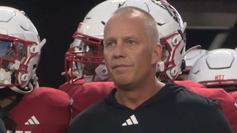 Dave Doeren prepares to lead the N.C. State Wolfpack onto the football field against Tennessee...