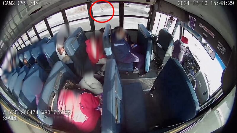 CMS Bus Caught in Crossfire