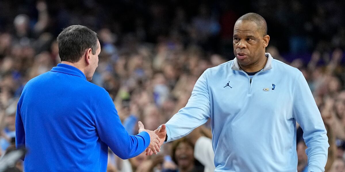 Davis gets new deal, raise with No. 1 UNC after first-year run