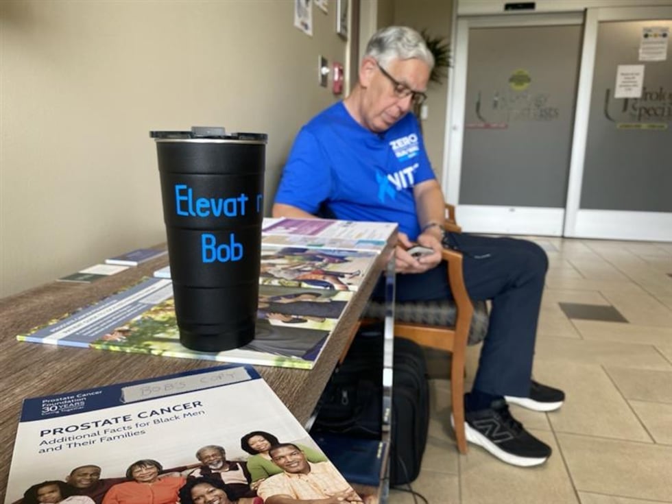 Prostate Cancer Survivor and ERLEADA patient Bob Lane waits to speak with patients in the...