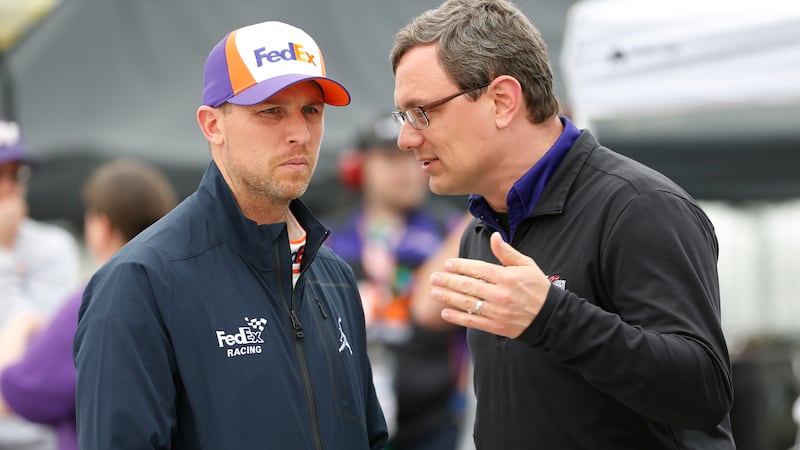 Chris Gabehart (right) was sued by his former employer, Joe Gibbs Racing.